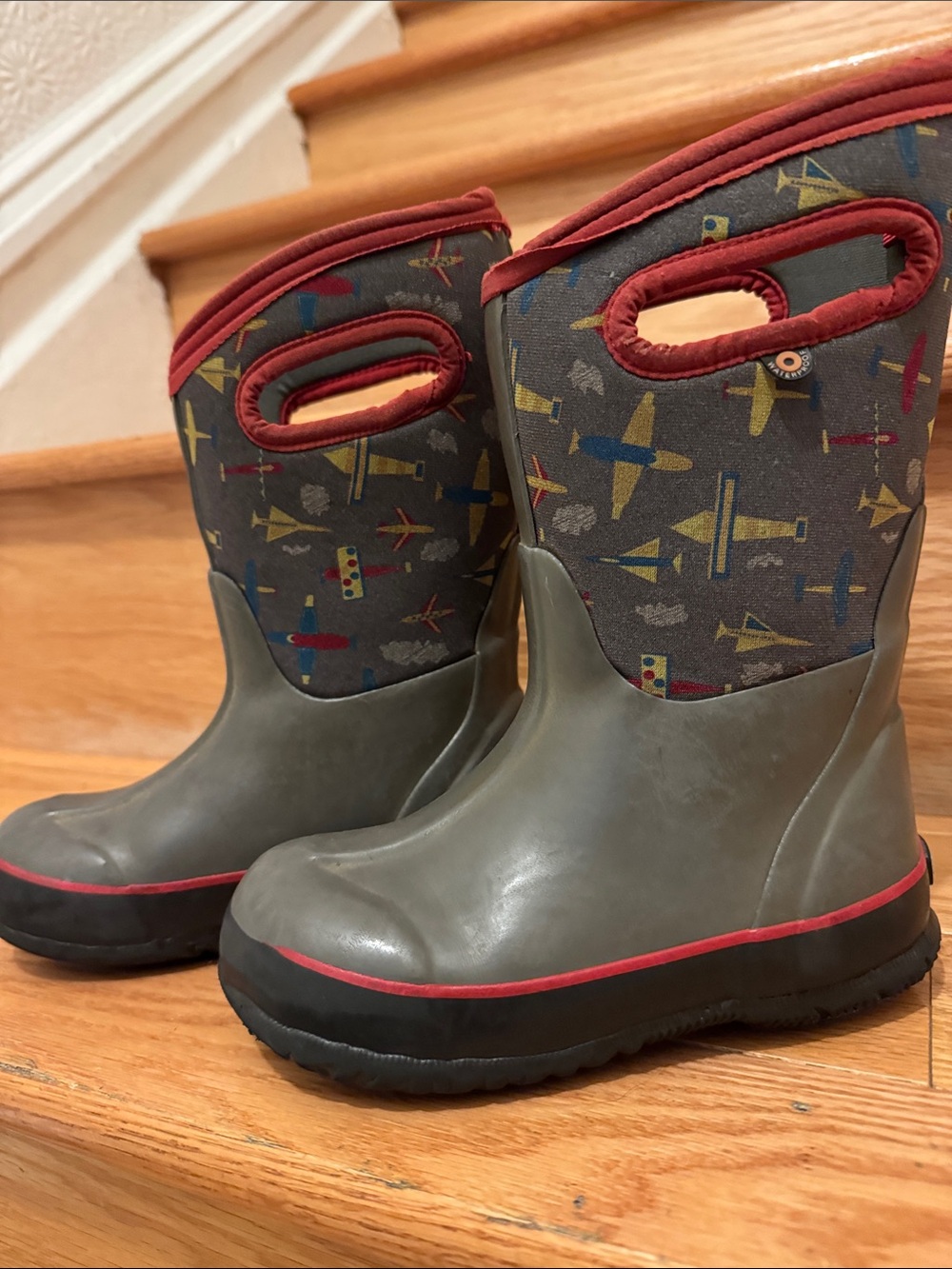 Bogs Kids Grey Rain Boots with Red Trim and Airplane Print